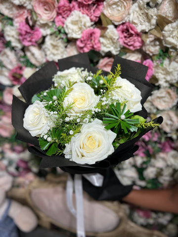 5 Roses with a Touch of Baby breath and Green leaves